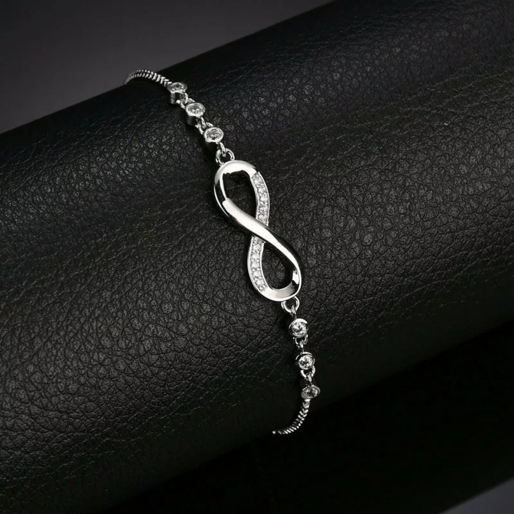 Infinity Sign Bracelet with Zirconia Diamonds Front View in Sterling Silver